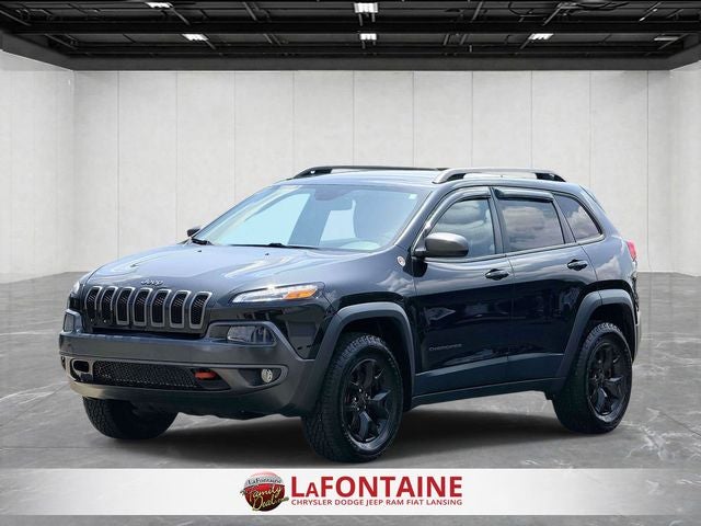2015 Jeep Cherokee Trailhawk in Brilliant Black Crystal Pearl — front three-quarter view