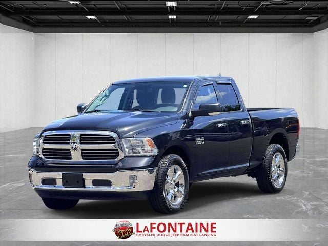 2018 RAM 1500 Big Horn Quad Cab 4x4 6'4' Box in Brilliant Black Crystal Pearlcoat — front three-quarter view