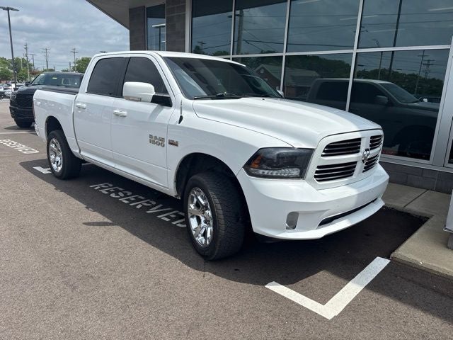 2015 RAM 1500 Sport in Bright White Clearcoat — front three-quarter view