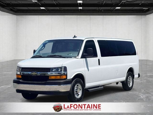 2025 Chevrolet Express Passenger RWD 3500 Extended Wheelbase LT in Summit White — front three-quarter view
