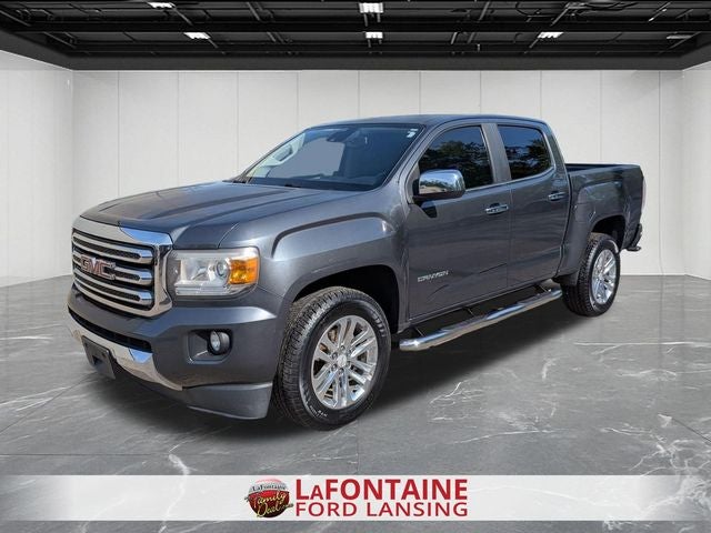 2016 GMC Canyon SLT in Cyber Gray Metallic — front three-quarter view
