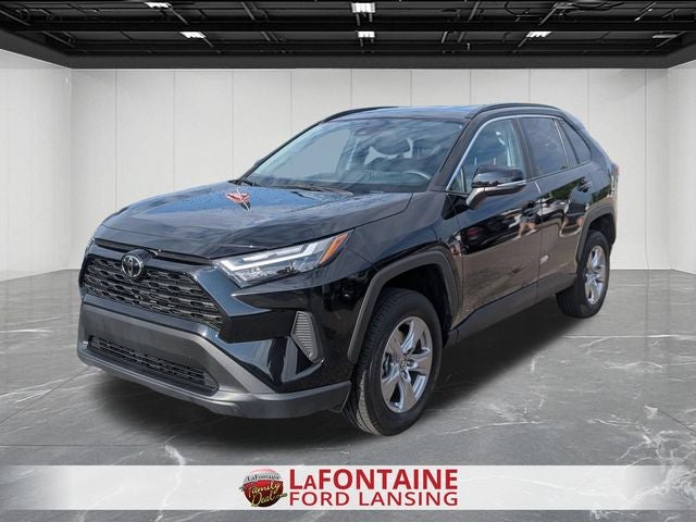 2025 Toyota RAV4 XLE in Midnight Black Metallic — front three-quarter view