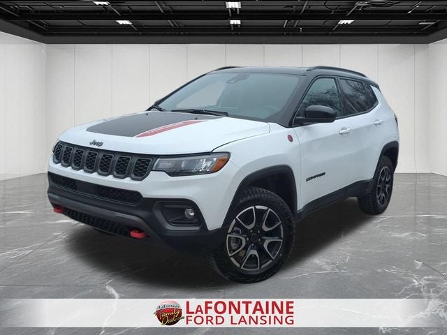 2025 Jeep Compass Trailhawk in Bright White Clearcoat — front three-quarter view