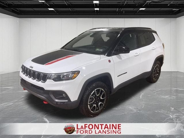 2025 Jeep Compass Trailhawk in Bright White Clearcoat — front three-quarter view