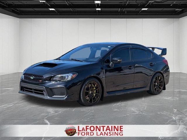 2018 Subaru WRX STi Limited in Crystal Black Silica — front three-quarter view