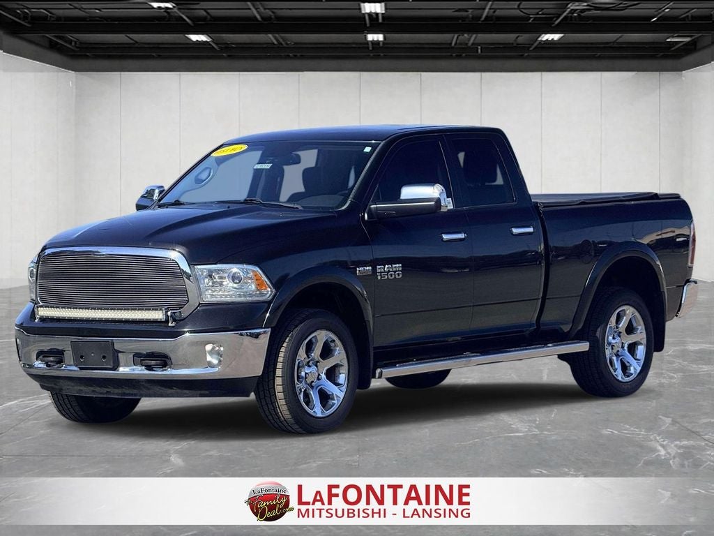 2016 RAM 1500 Laramie in Brilliant Black Clearcoat — front three-quarter view