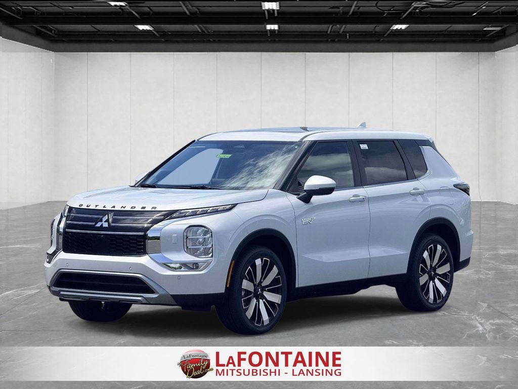 2026 Mitsubishi Outlander PHEV SE in Diamond White — front three-quarter view